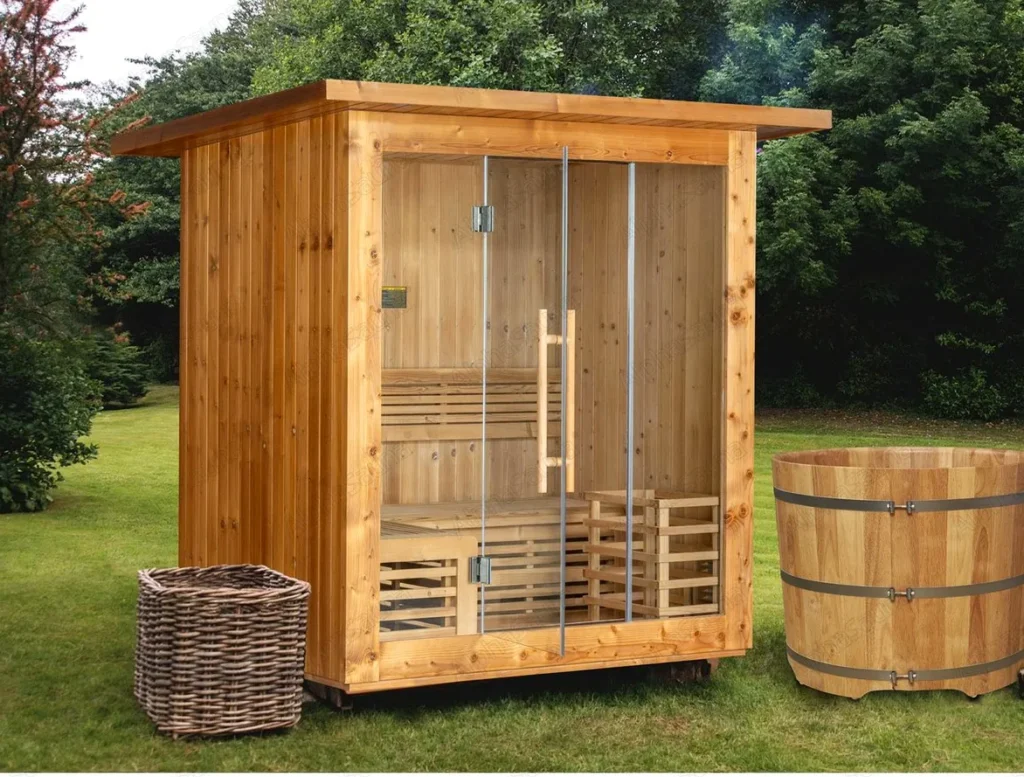 Outdoor cedar sauna with a wooden cold plunge tub