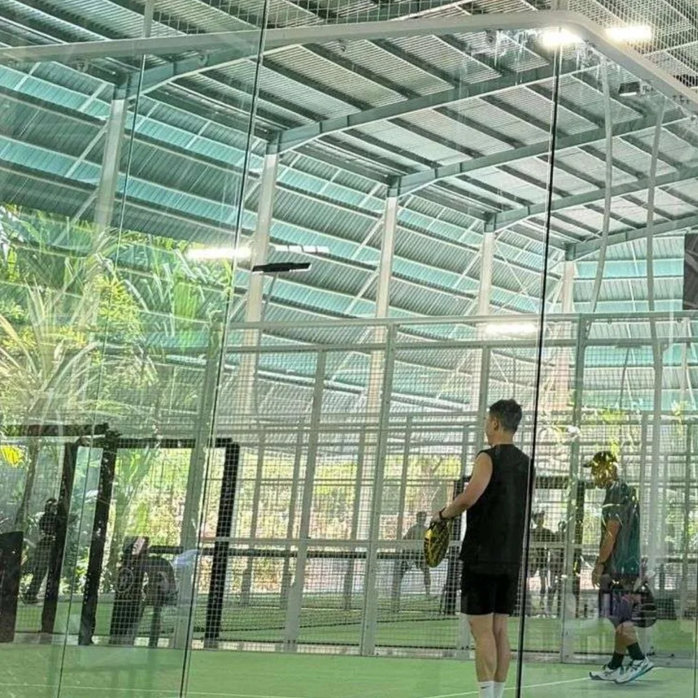 Full panoramic padel court with glass on all sides by Dream Courts in Bali